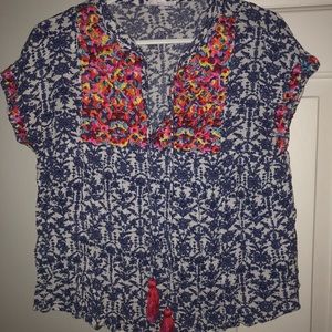 Tassel short sleeve top is a size Small.
